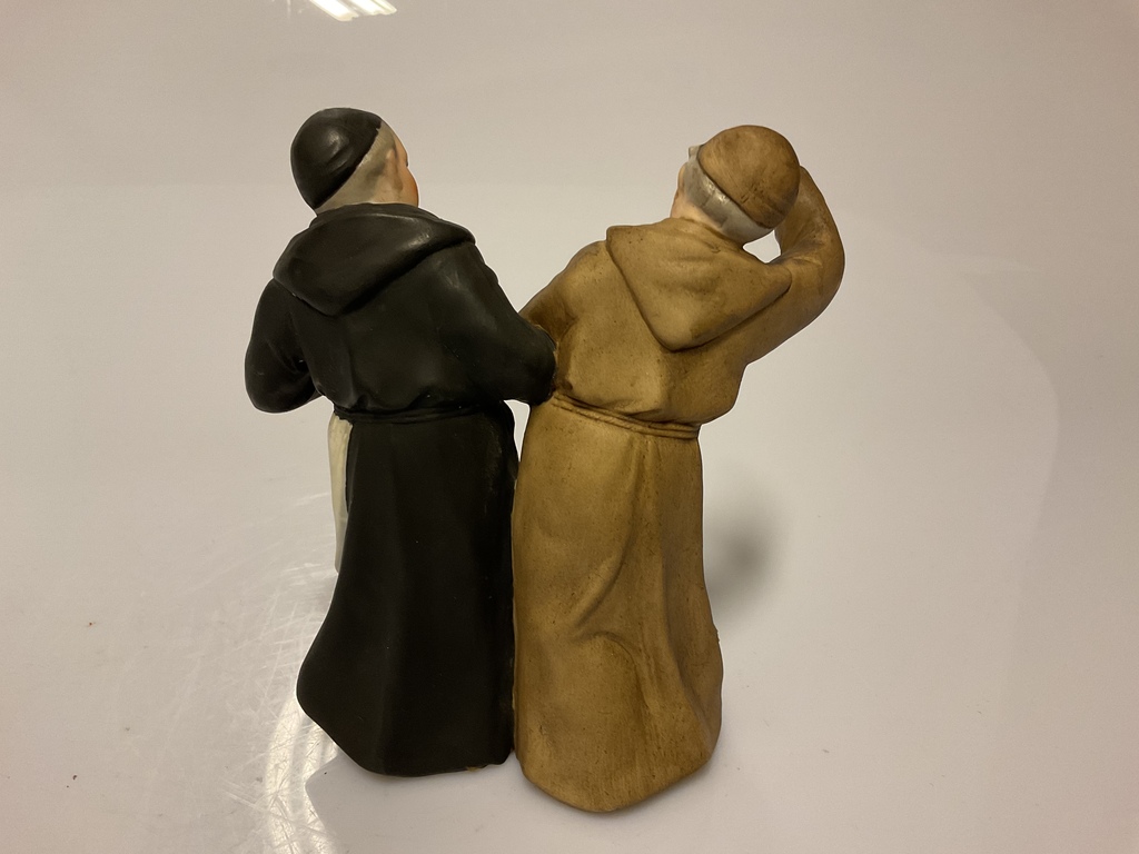 Two dancing monks