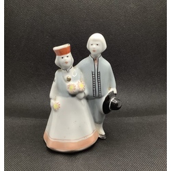 Latvians on a walk.Couple in folk costumes.Porcelain Figurine Riga 50s.Sculptor R.Pantsekhovskaya.Height 11cm.