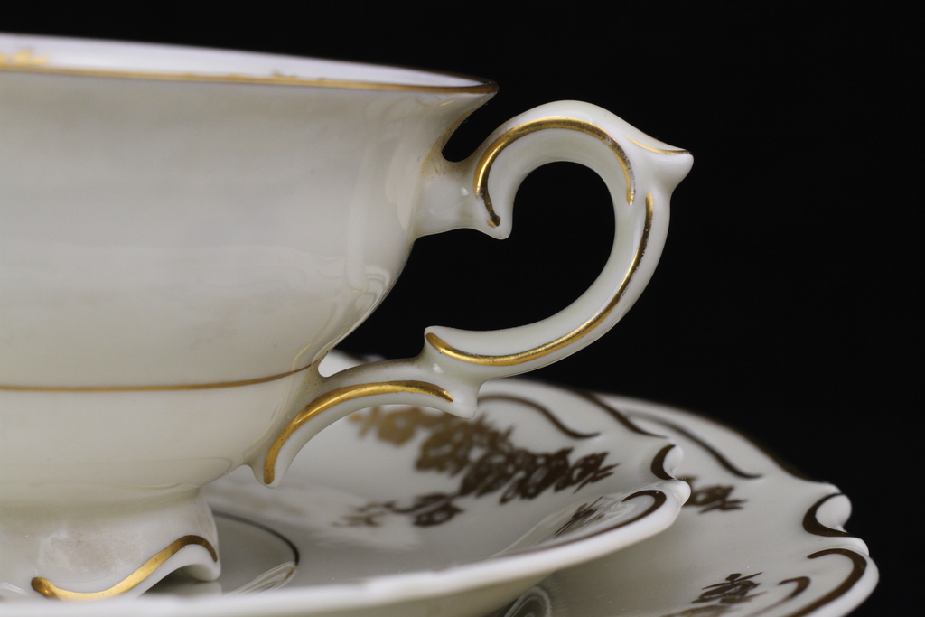 Cup with duo set of saucers