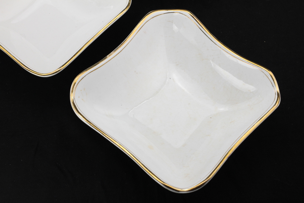 Three irregularly shaped porcelain bowls