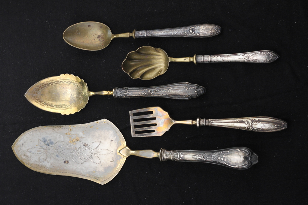 five different silver cutlery