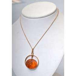 Gold necklace with amber pendant