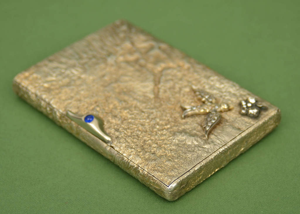 Gold-plated silver case with diamonds