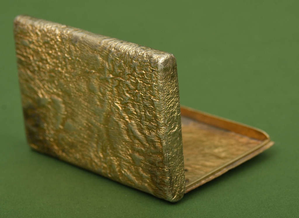 Gold-plated silver case with diamonds