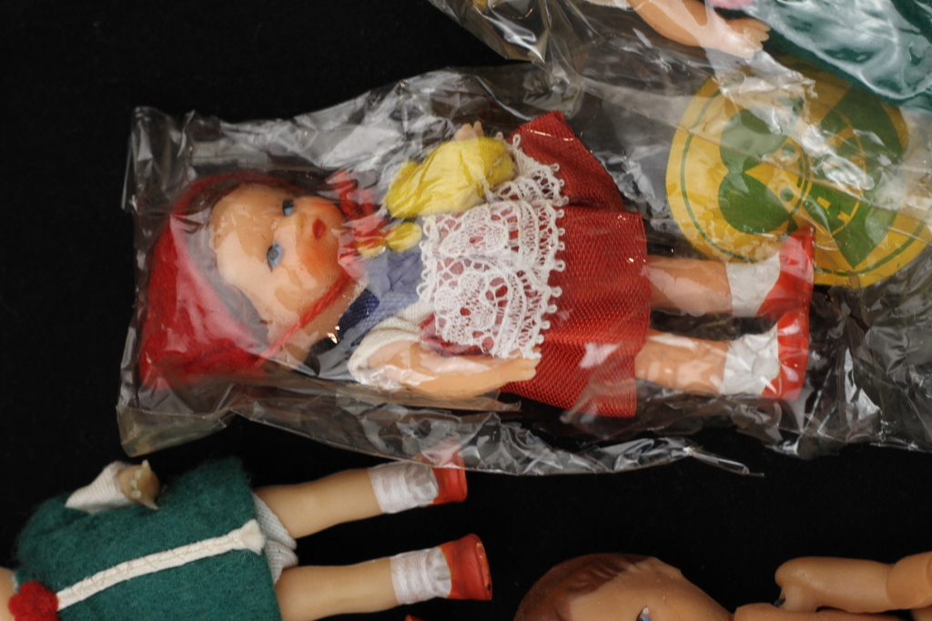 Set of 7 miniature dolls