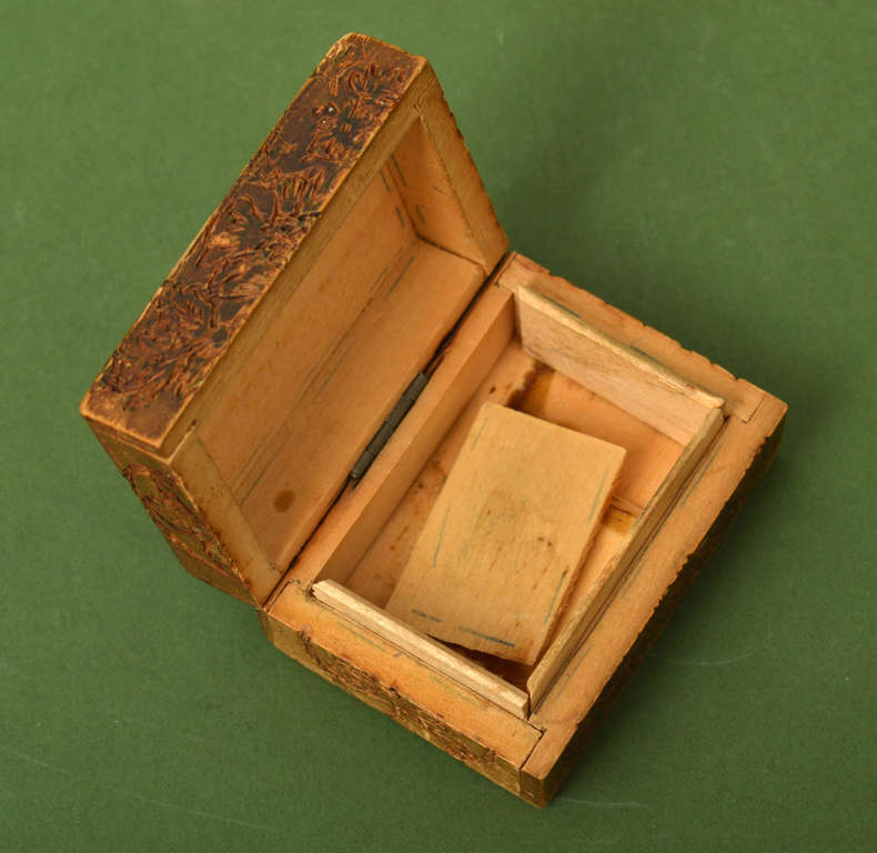 Wooden box with wood carvings