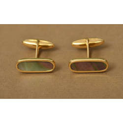 Gold cufflinks with mother of pearl