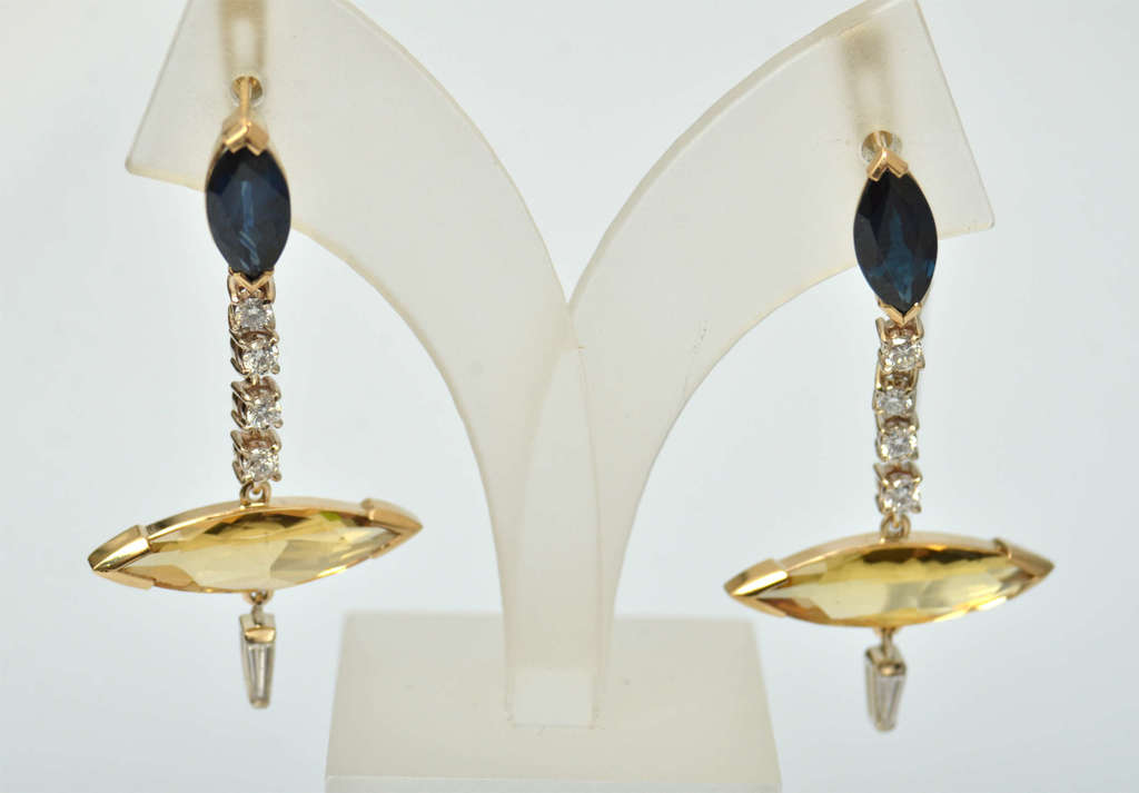 Earrings with diamonds, gold beryllium and sapphires