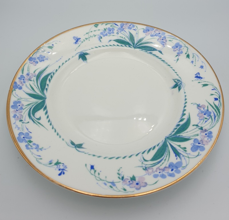 Porcelain cup with saucer and plate