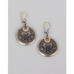 Silver earrings with a decorative pattern