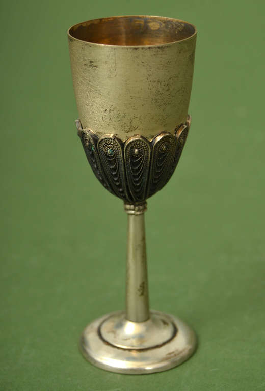 Silver cup on a leg