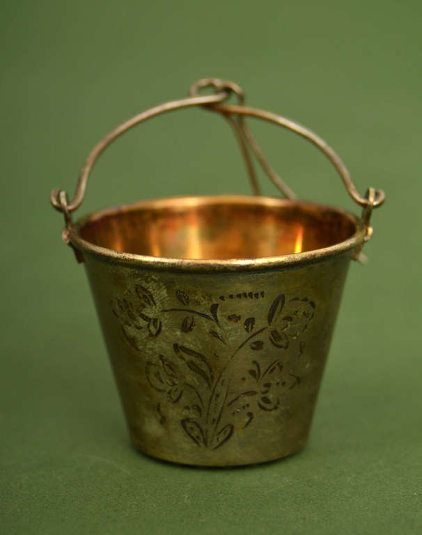 Silver tea strainer with engraving