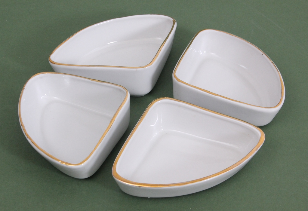 Set of four porcelain plates for snacks