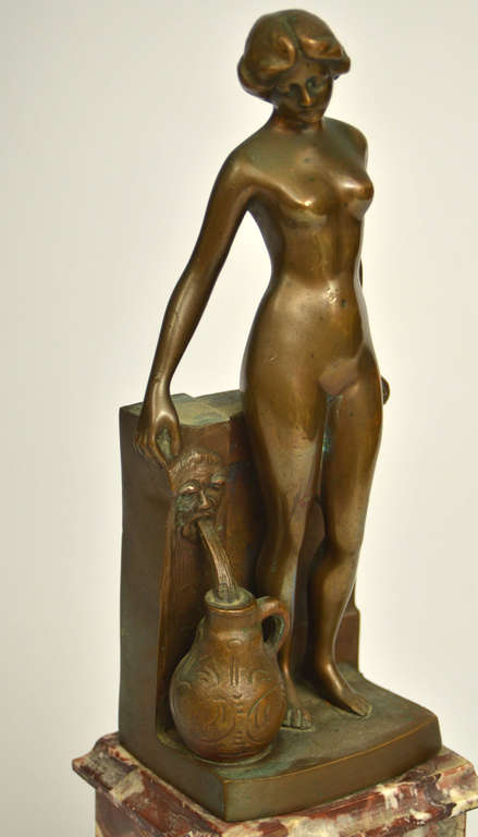 Bronze figure on a marble base 