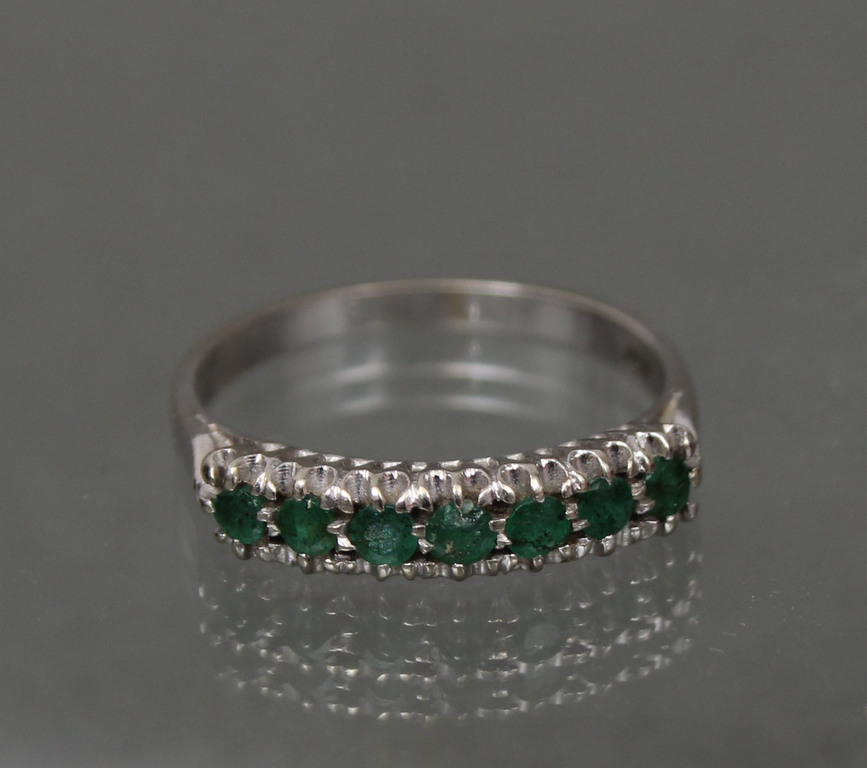 Gold ring with emeralds