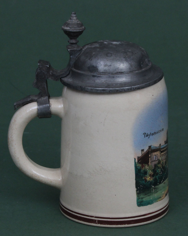 Porcelain cup with metal lid 