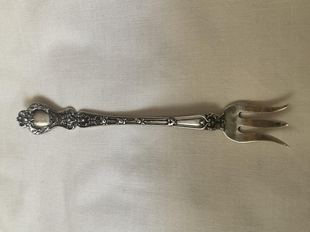 ALVIN  silver olive or seafood fork . Antique 