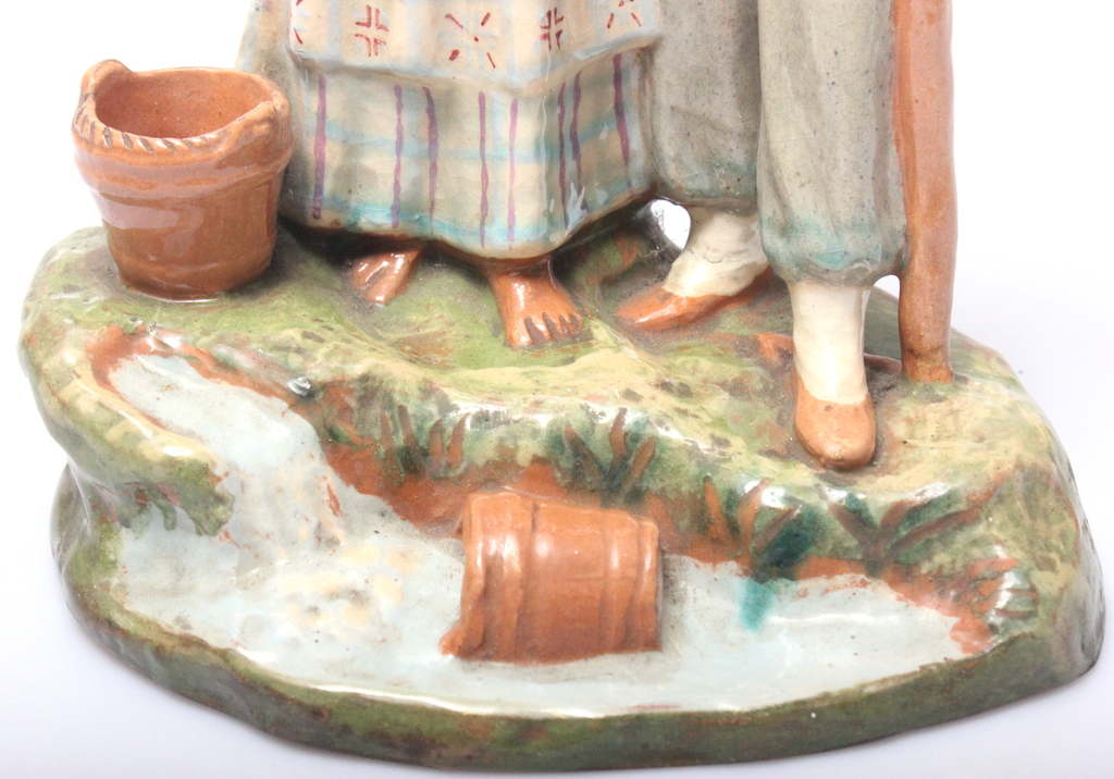 Ceramic figurine Girl with a boy at the spring