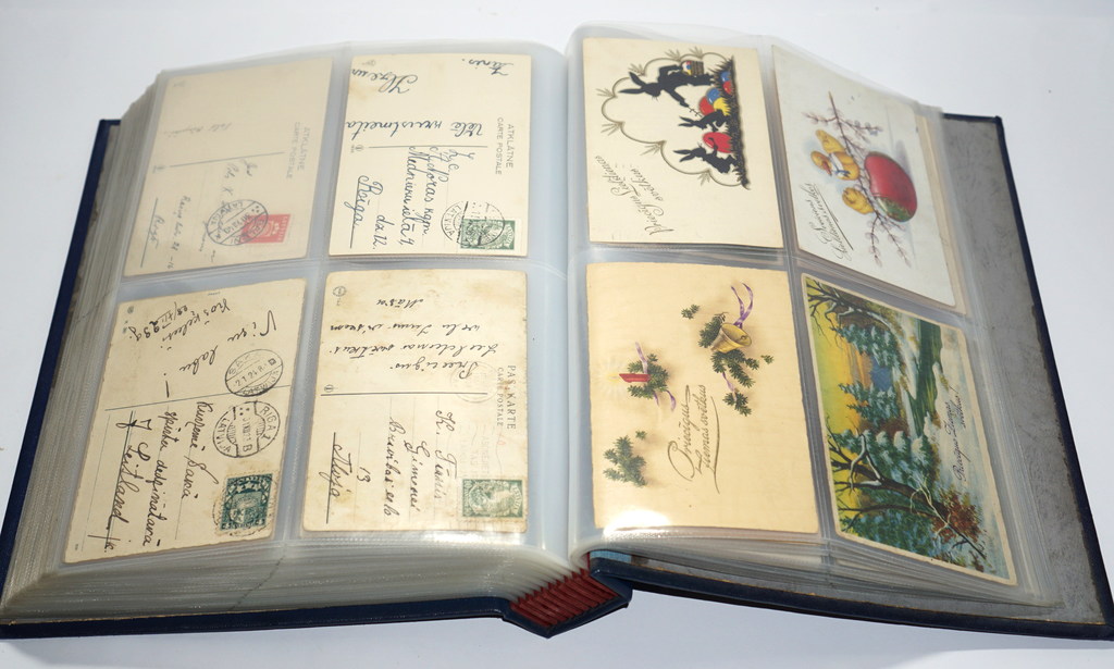 The collection of postcards of greeting in the album 213 pieces.
