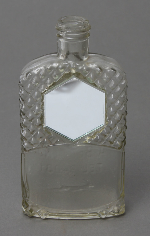 Liqueur bottle with a mirror