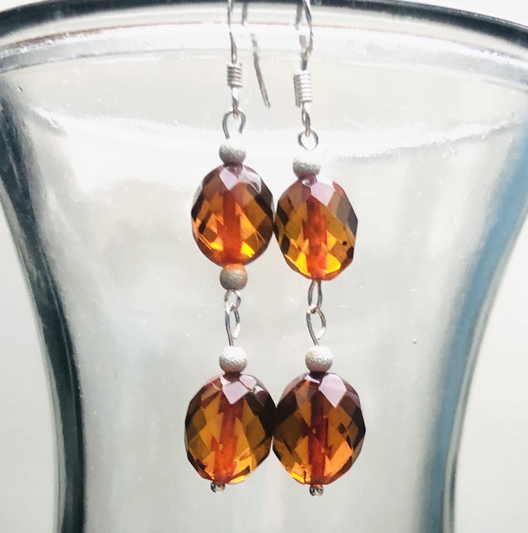 Silver earrings with polished (diamond cut) Amber