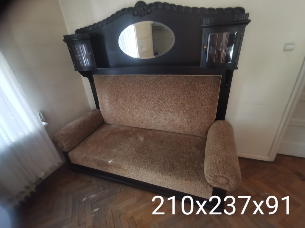 A sofa with a mirror