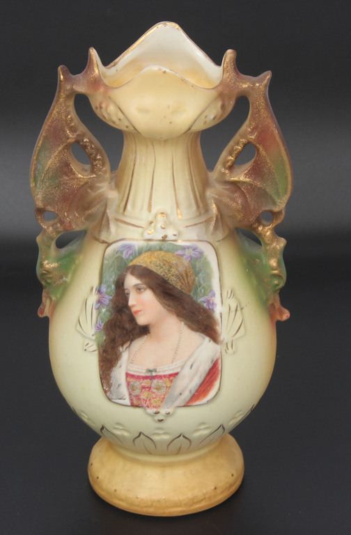 Porcelain vase with a portrait of a woman