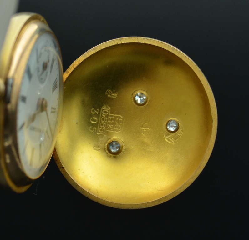 Women's gold pocket watch with diamonds 
