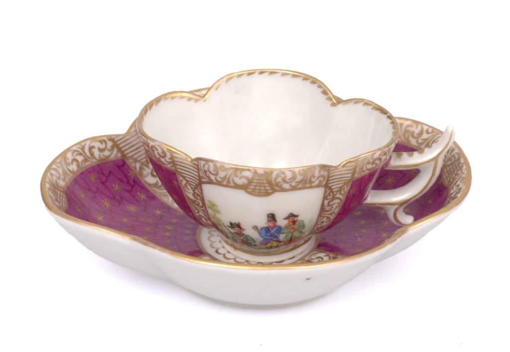 Porcelain cup with a saucer
