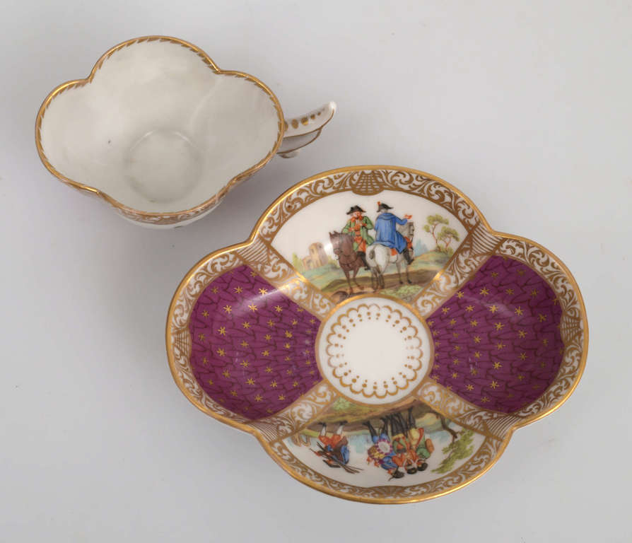 Porcelain cup with a saucer
