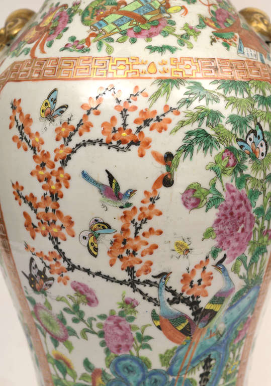 Zeltītas bronzas svečturis ar ķīnas apgleznotu porcelānu