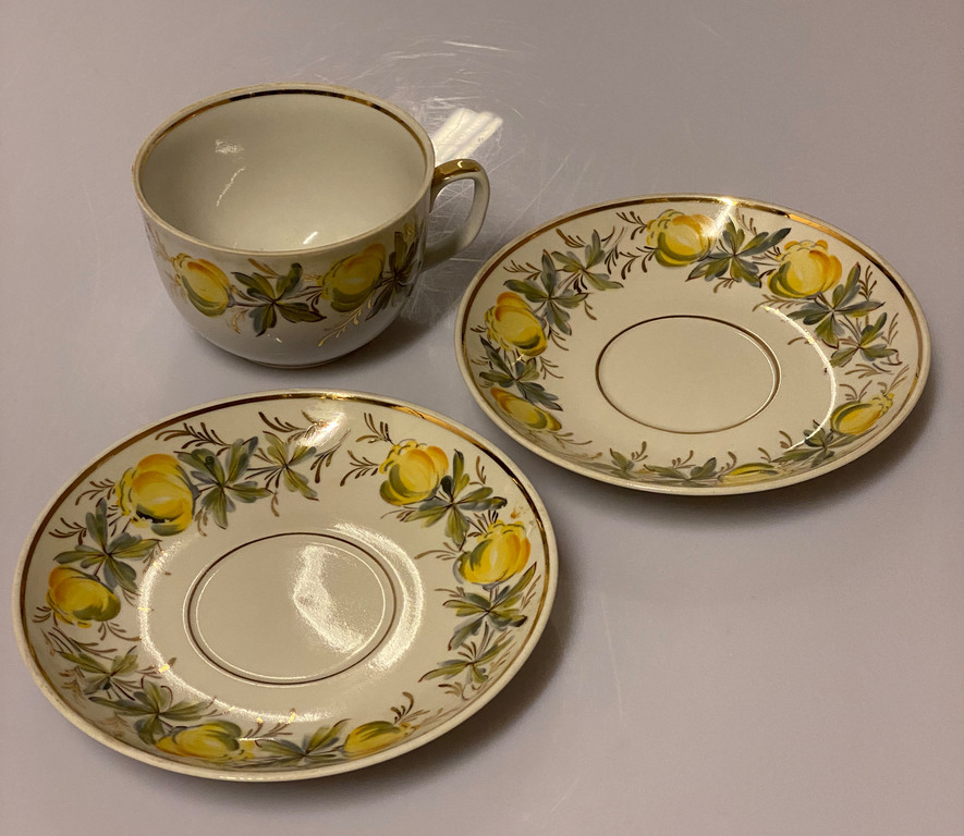 Porcelain tea cup with 2 saucers