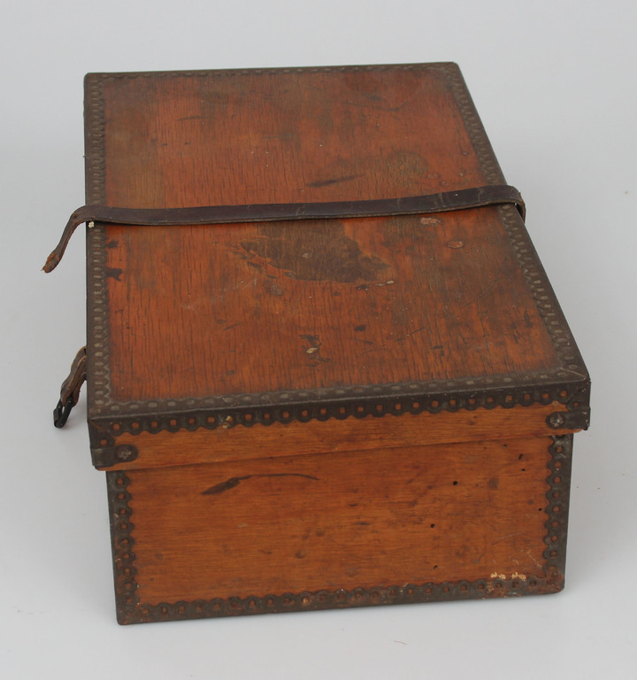Wooden chest-box with metal linings