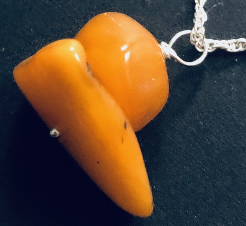 Yellow Vintage amber with silver chain.