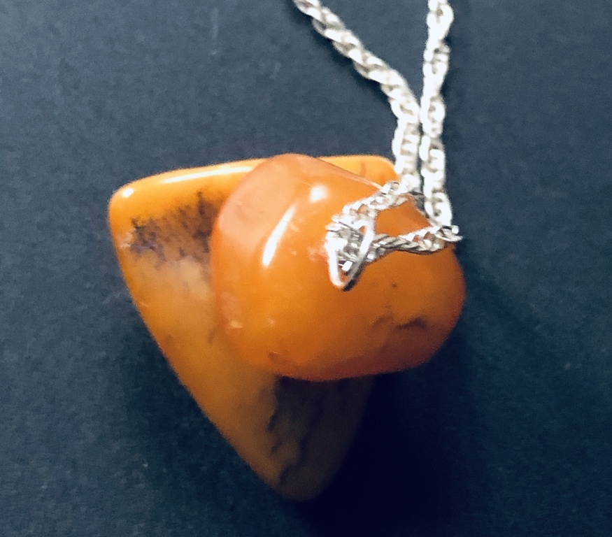 Yellow Vintage amber with silver chain.