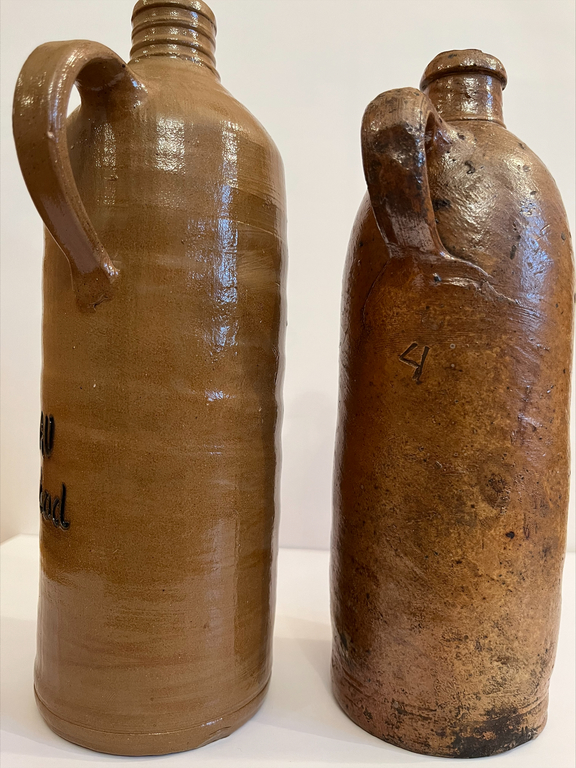 Two clay jugs of mineral water