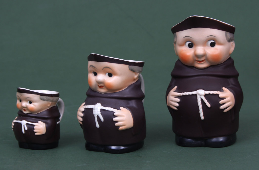 A set of creamers Three monks