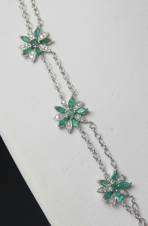 Women's white gold diamond and emerald necklace