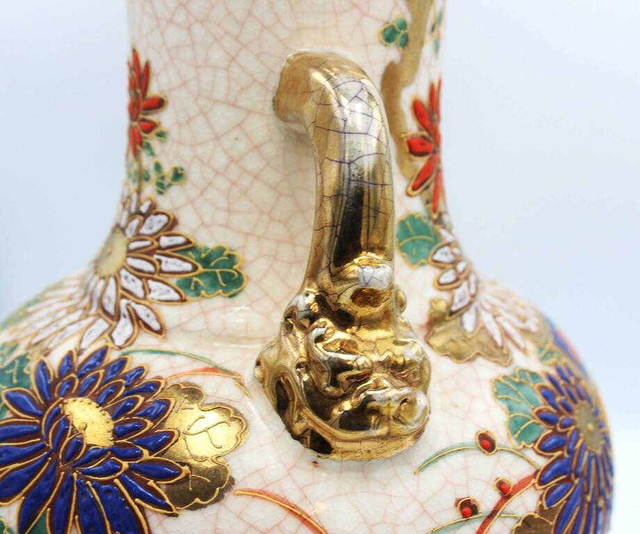 Faience vase with gilding and painting