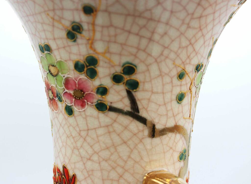 Faience vase with gilding and painting
