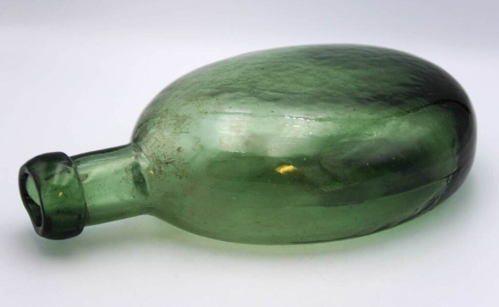 Green colored glass bottle