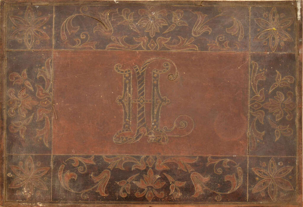 Wooden plaque with metal inlaid initials IH