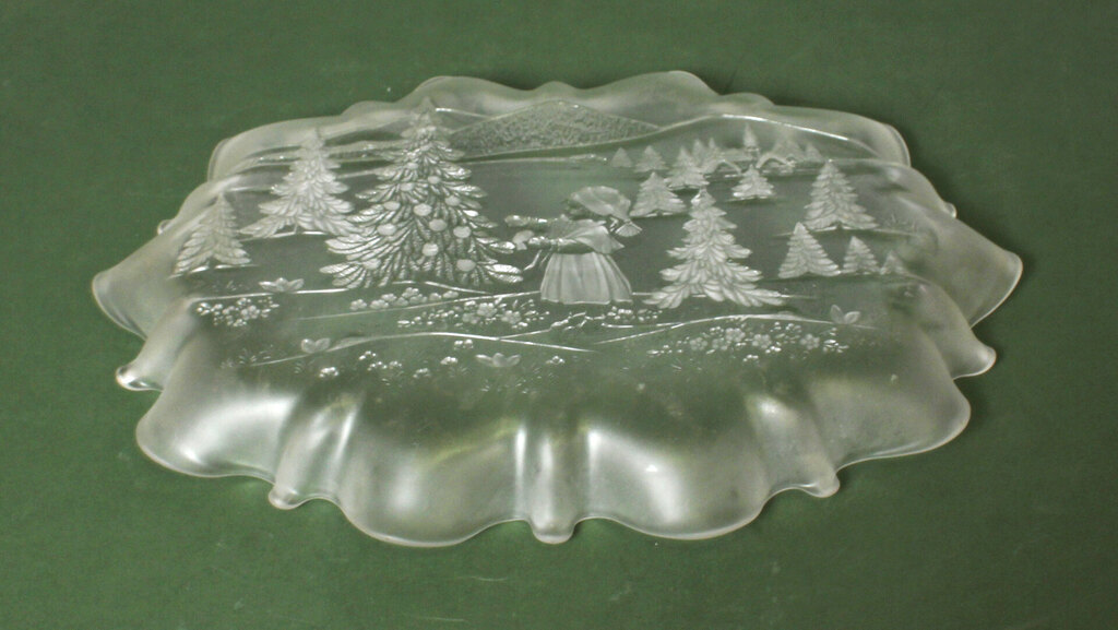 Decorative glass container with a Christmas motif