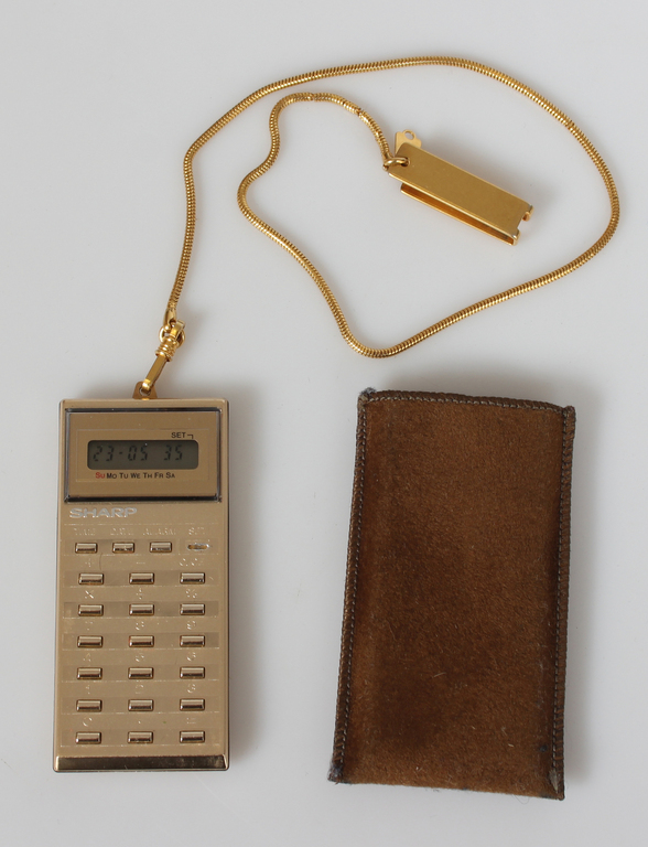 Electronic calculator, alarm clock, clock