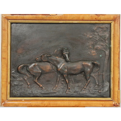 Bronze casting in wooden frame 