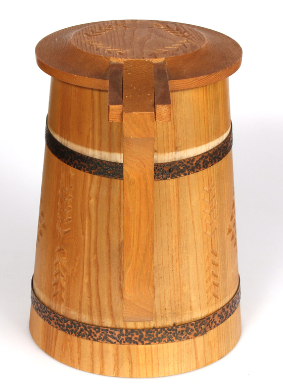 Large wooden beer mug with ornaments