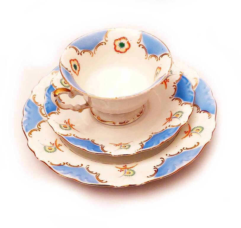 Painted Porcelain cup with two saucers