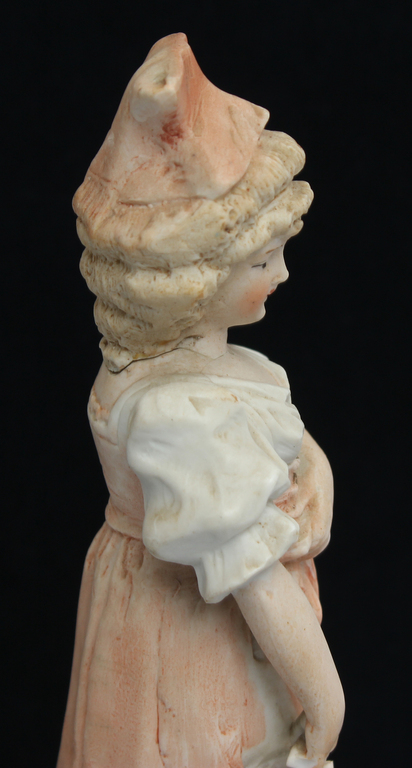 A biscuit figurine with a defect