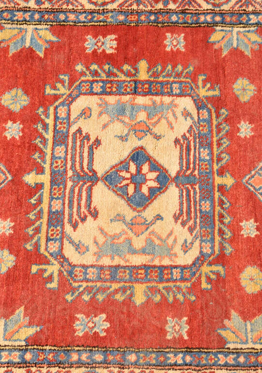 Red woolen carpet with earring pattern