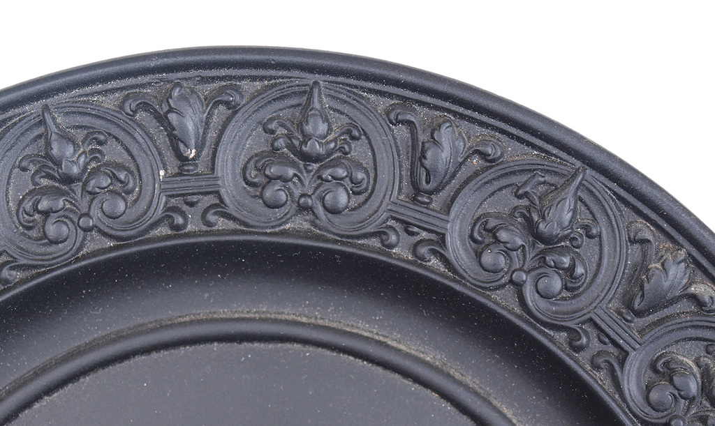 Decorative cast iron plate